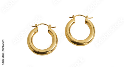 Gold hoops shine against a black background. Perfect for product shots, jewelry e-commerce, or branding.
