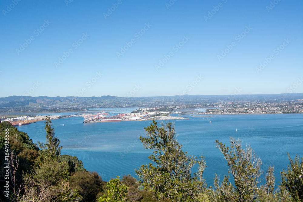Panoramic Coastal City View with Harbor and Blue Sky Panoramic Coastal City View with Harbor and Blue Sky