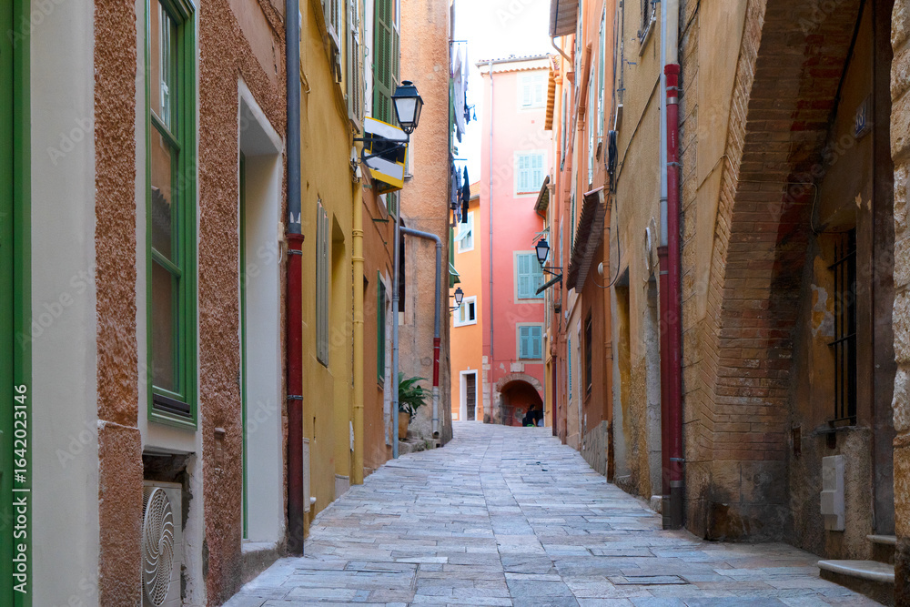 Fototapeta premium view of cosy street in old town of villefranche, Nice, France