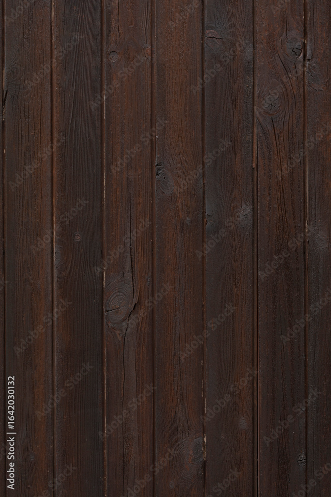 Naklejka premium Dark stained wood panels