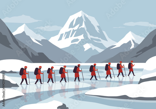 Hikers in Red Trekking Across Frozen Lake in Snowy Mountains.