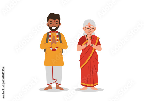 Smiling Indian Man and Woman in Traditional Clothing Namaste Gesture.