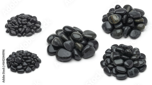 Collection of Smooth Black River Stones Displayed on White Backdrop for Spa or Zen Garden Design and Relaxation Concepts