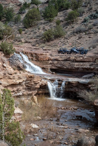 UTVs at waterfall