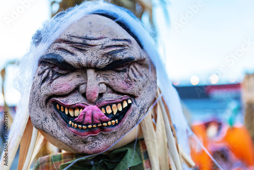 Valokuva Wrinkled Old Hag Mask with Menacing Expression for Spooky Halloween Costume Part
