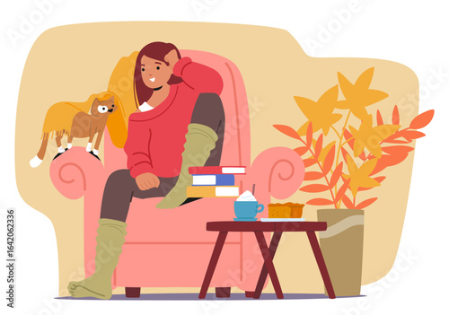Young woman wearing warm autumn clothes sitting in armchair resting enjoying peaceful seasonal time