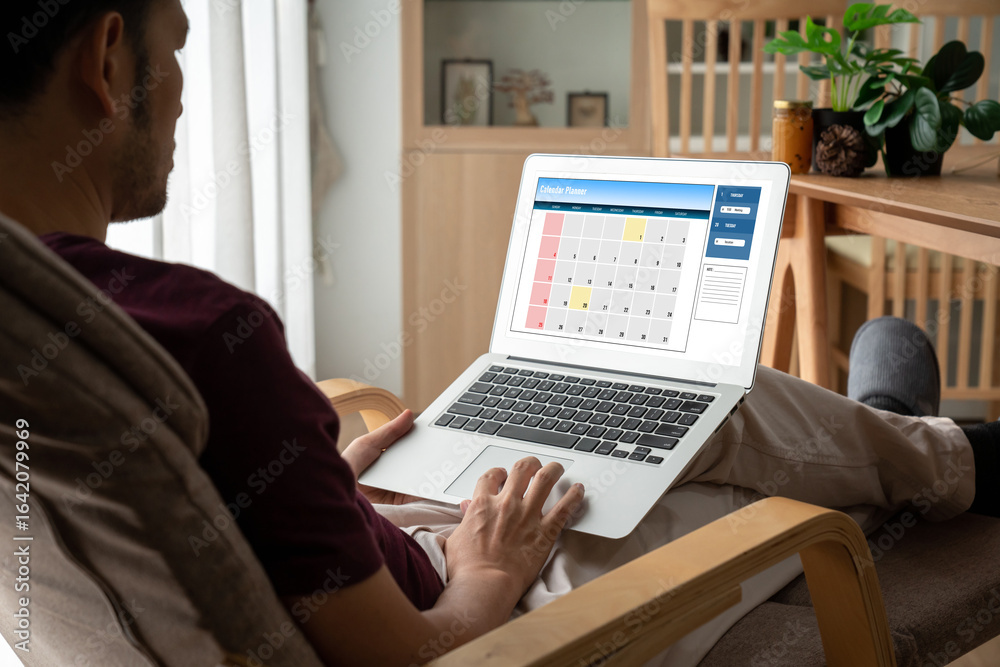 Calendar on computer software application for modish schedule planning for personal organizer and online business Calendar on computer software application for modish schedule planning for personal organizer and online business