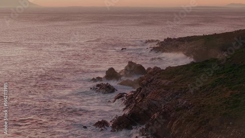 Ocean landscape with waves and dramatic evening light