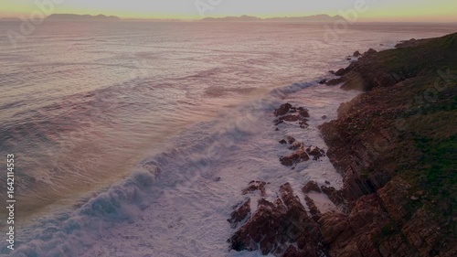 Ocean landscape with waves and dramatic evening light