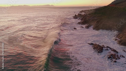Ocean landscape with waves and dramatic evening light