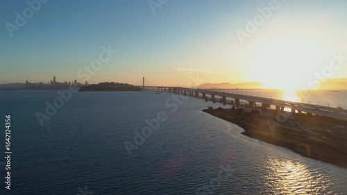 Wallpaper Mural Aerial view of the Bay Bridge, Oakland, California, USA, at sunrise. Cars travel across the bridge, connecting San Francisco to the East Bay. Torontodigital.ca