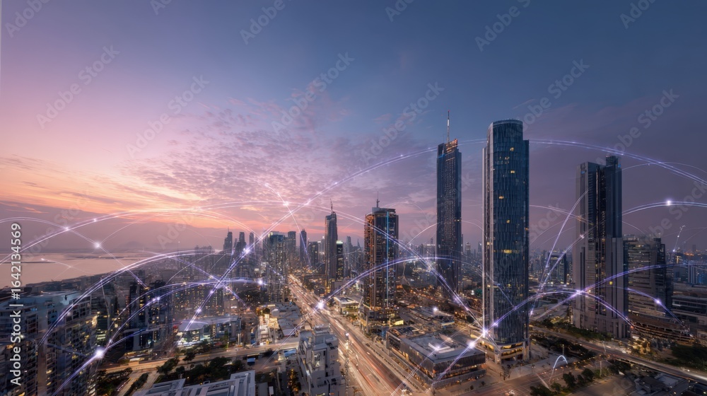 Fototapeta premium Aerial View of Modern Cityscape with Network Connection Overlay at Twilight, Representing Global Connectivity