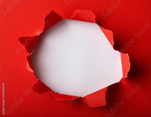 gap in torn red paper on white background copy space