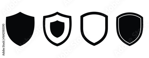 Four Black and White Shield Icons of Varying Designs protection security