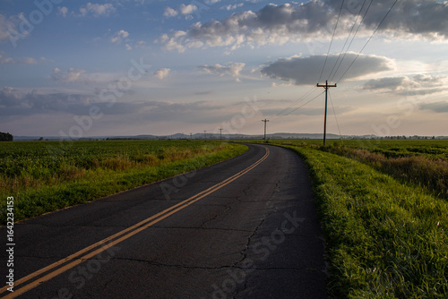 Pretty clouds above a highway and powerlines in rural Missouri