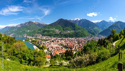Wallpaper Mural Panoramic view of alpine town nestled by lake and mountains Torontodigital.ca