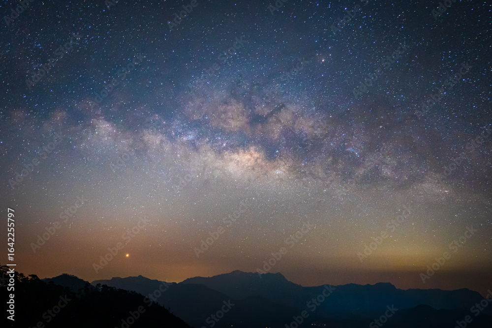 Fototapeta premium Beautiful landscape of Milky Way at Doi Luang Chiang Dao Mountain Peak viewpoint in the National Park at the Chiang Dao Camp site.