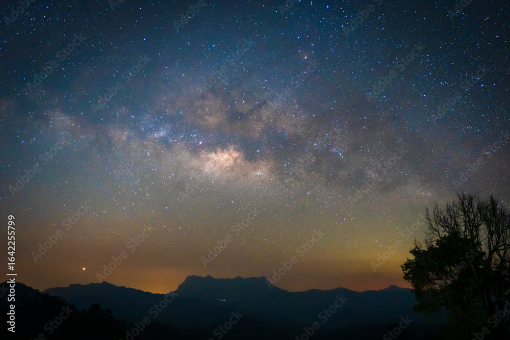 Fototapeta premium Beautiful landscape of Milky Way at Doi Luang Chiang Dao Mountain Peak viewpoint in the National Park at the Chiang Dao Camp site.
