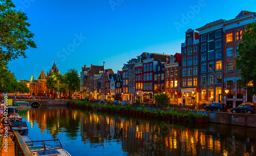 Photography Red light district (De Wallen) at night in Amsterdam, the Netherlands