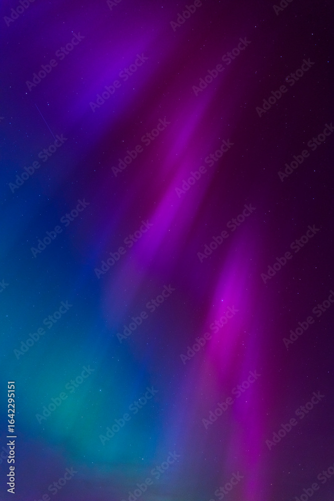 Obraz premium Rare multi-coloured aurora borealis above the skies in Dorset