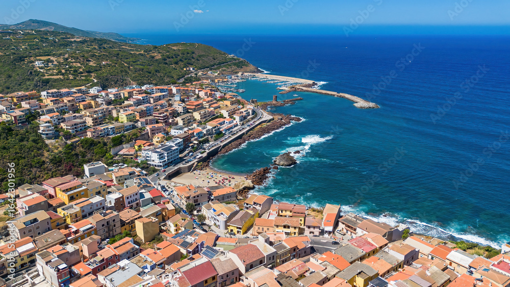 Fototapeta premium Aerial view of marina of Castelsardo, a fortified Genoese city built on a headland overlooking the Mediterranean Sea on the Italian island of Sardinia