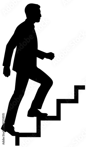Silhouette of a Businessman Climbing Stairs