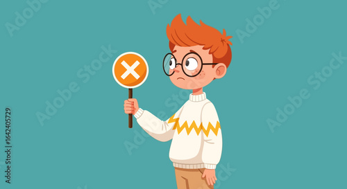 A young boy with red hair and glasses holding a sign with a red cross showing disapproval or a wrong answer in an educational context
