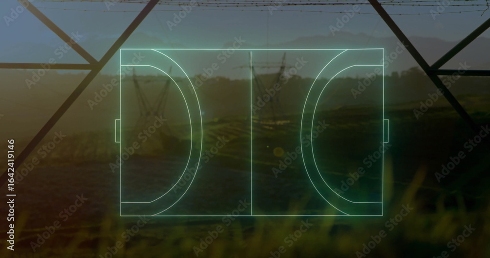 Obraz premium Projecting glowing holographic soccer field overlay over fields with grass, steel tower and pylons