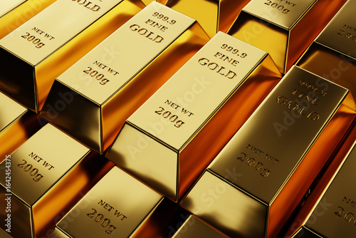 Fotografija Close-up of stacked gold bars marked 999