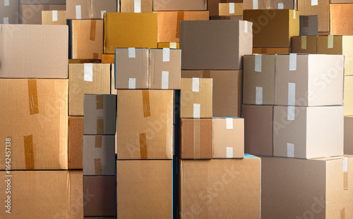 Stacked cardboard boxes pre...