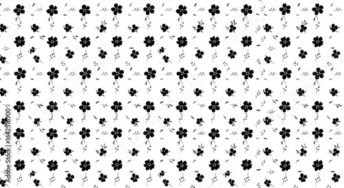 Black and white floral pattern design, repeating small flowers on a white background.
