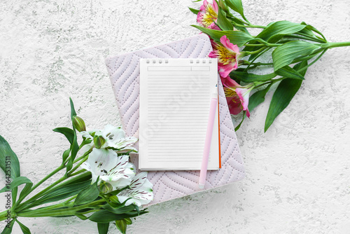 Notebooks, pen and beautifu...