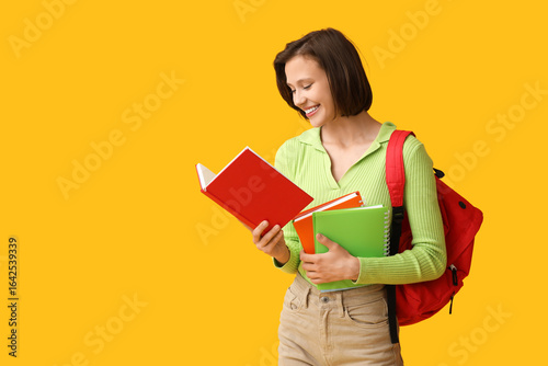 Beautiful female student wi...