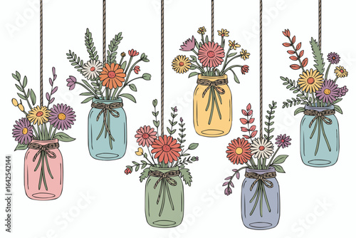 Hanging Mason Jar Flower Arrangements In Pastel Colors