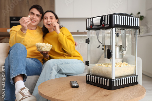 Cute couple watching movie ...