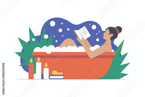 Woman reading book in bathtub with candles relaxation