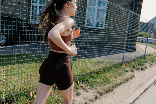 A healthy young woman enjoying a morning jog in Copenhagen