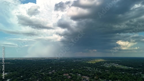 Timelapse Drone Video of Thunderstorm and Microburst Forming Over Suburban Landscape
