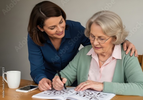 Woman helping senior with crossword puzzle, care concept