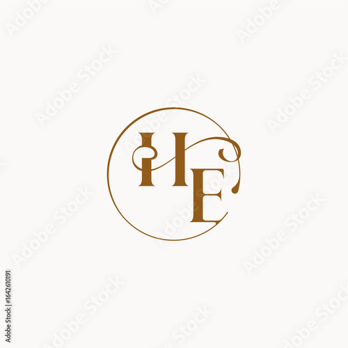 circle fows wedding logo monogram elegant style letter luxurius feeling with flow HE