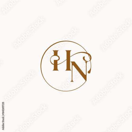 circle fows wedding logo monogram elegant style letter luxurius feeling with flow HN