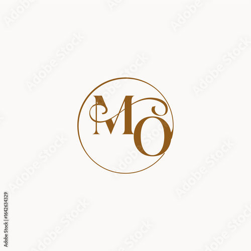 monogram elegant style luxurius feeling with flow MO circle fows wedding logo letter