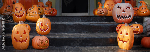 Halloween jack-o-lantern pumpkin decorations on back porch