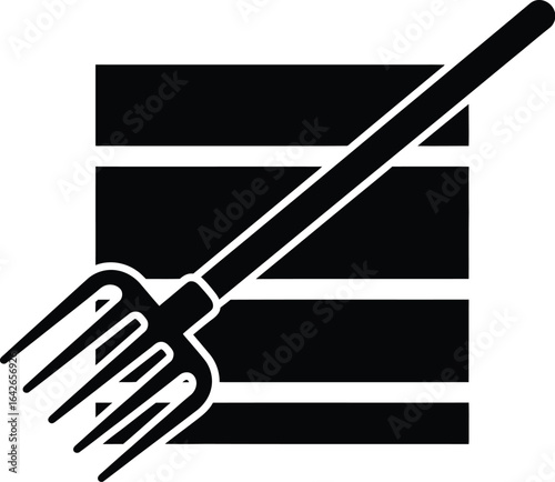 A black vector illustration of a pitchfork in front of a stack of hay, perfect for agricultural or farming-themed designs