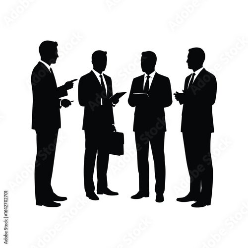 Silhouette of four businessmen in suits discussing business holding tablets and briefcase