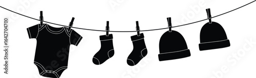 Black silhouette baby clothes hanging on clothesline, infant bodysuit socks hats drying, newborn apparel laundry line, simple children’s clothing, flat vector illustration