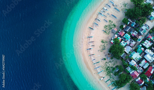 Drone perspective of coastal life in a tropical island destination.