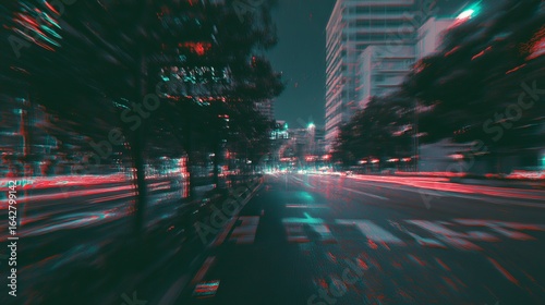 Blurry night city street, vibrant distorted colors