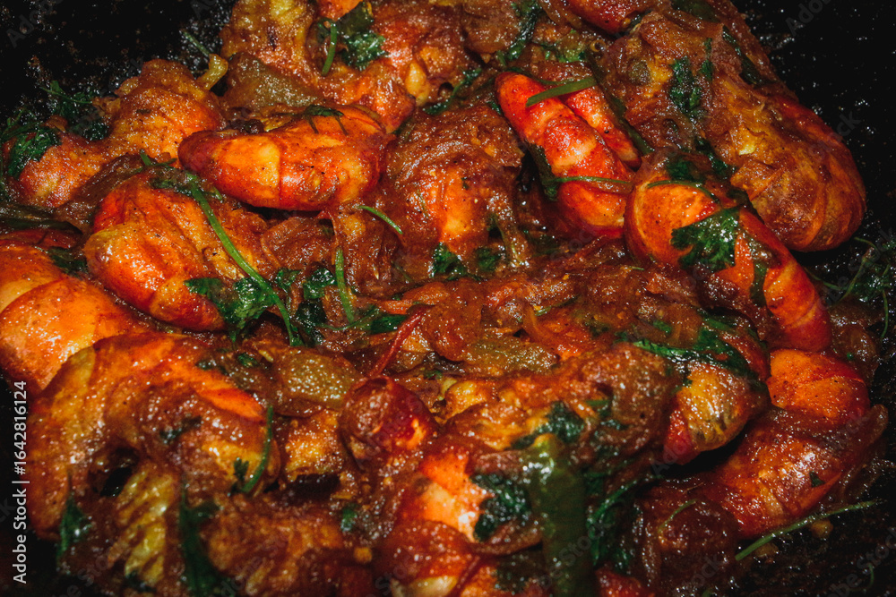A Delicious and Authentic Bengali and Indian Seafood Dish, Cooked in a Pan with Aromatic Spices and Herbs, Representing Traditional Regional Cuisine A Delicious and Authentic Bengali and Indian Seafood Dish, Cooked in a Pan with Aromatic Spices and Herbs, Representing Traditional Regional Cuisine