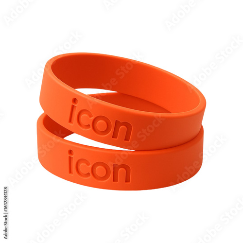 Two orange silicone wristbands with the word icon embossed on them isolated on transparent background